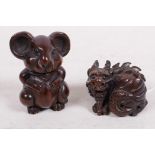 Two carved wooden netsuke, a mouse 2" high, and a coiled dragon, both signed with seal marks