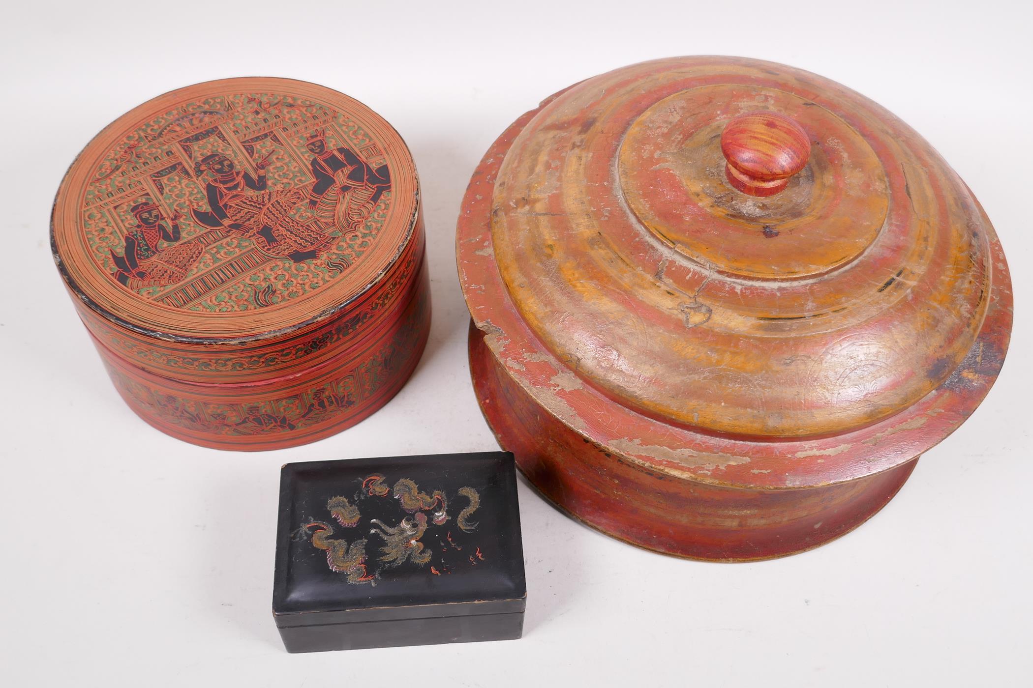 A Burmese turned and painted circular box and cover, 10½" diameter, together with an Indian circular