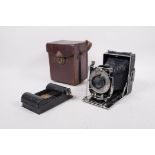 An early C20th German Ihagee folding plate camera, with a Compur leaf shutter by F. Deckel and a