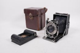 An early C20th German Ihagee folding plate camera, with a Compur leaf shutter by F. Deckel and a