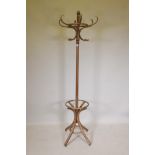 A bentwood stick and coat rack