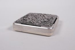 A Sino-Tibetan white metal incense box and cover, with auspicious symbol and lotus flower decoration