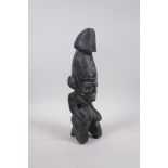 An Oriental carved hardstone phallic figure, 11" high