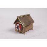 A brass vesta case in the form of a dog kennel, 2" long