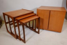 A G-Plan quadrille nest of three teak tables, 21" x 17" x 21"