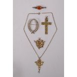 A collection of antique pinchbeck jewellery to include pendants and brooches