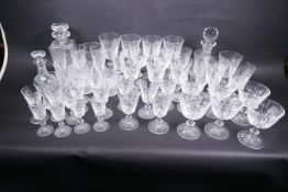 A large suite of Edinburgh Crystal glassware including three decanters, water jug, tankard etc (50+)