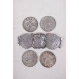 Four facsimile white metal coins and a white metal and coin set belt buckle, coins 1½" diameter