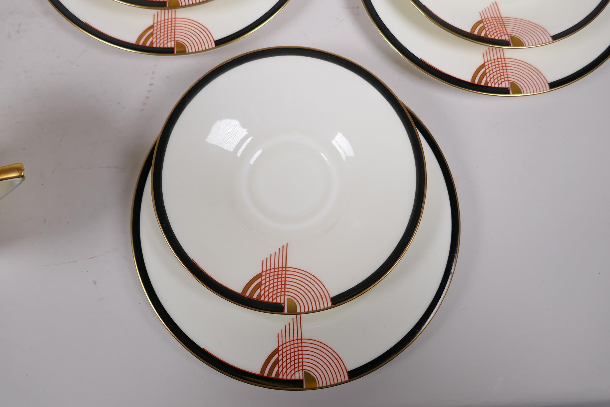 A six setting Royal Doulton 'Tango' pattern tea service to include cups, saucers, cake plates, - Image 3 of 9