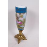 A Sevres style ormolu and porcelain vase decorated with a classical scene and garlands of flowers on