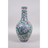 A Chinese doucai porcelain bottle vase decorated with dragons amongst flowers, seal mark to base,