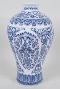 A Chinese blue and white meiping vase with character and floral decoration, 9" high
