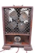 A vintage mahogany case ozone generator from Ozonair, London, 12½" high