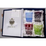 Faberge - a harlequin set of four cut glass tumblers, in a presentation box