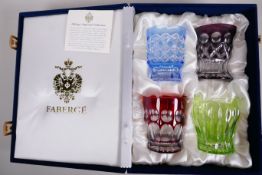 Faberge - a harlequin set of four cut glass tumblers, in a presentation box