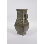 A Song style celadon crackle glazed porcelain vase with two lug handles, inscription to side,