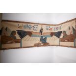 An Egyptian revival wall hanging depicting a winged deity and two sphinx, 57" x 18", A/F