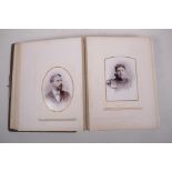 A late C19th/early C20th German leather bound photograph album containing portrait photos from the