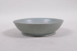 A Ru ware style celadon glazed porcelain dish, character inscription to base, Chinese origin, 5½"