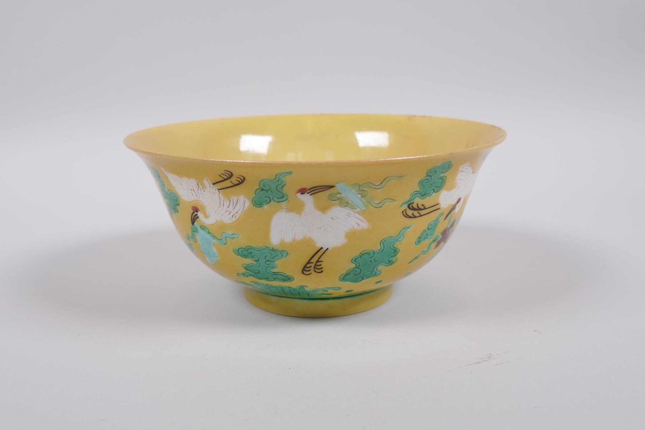 A Chinese yellow ground porcelain rice bowl decorated with red crowned cranes in flight, 6 character - Image 2 of 8