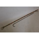 An oriental silver mounted bamboo walking cane, 36" long, together with an antique bamboo library