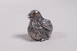 A novelty miniature sterling silver figure of a chick, 1"