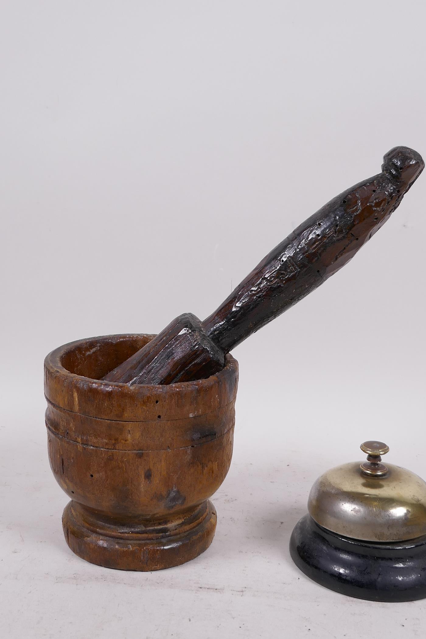 An antique French wooden mortar and pestle, mortar 4" high, and a reception desk bell - Image 2 of 3