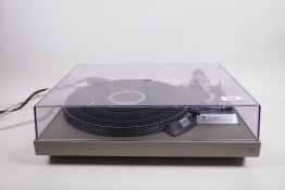 A Technics SL23 direct drive turntable with manual, 17" x 13"