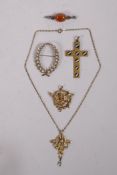 A collection of antique pinchbeck jewellery to include pendants and brooches