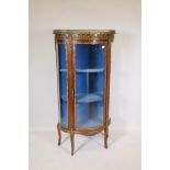 A French mahogany and ormolu mounted Louis XV style vitrine, with serpentine front and marble top