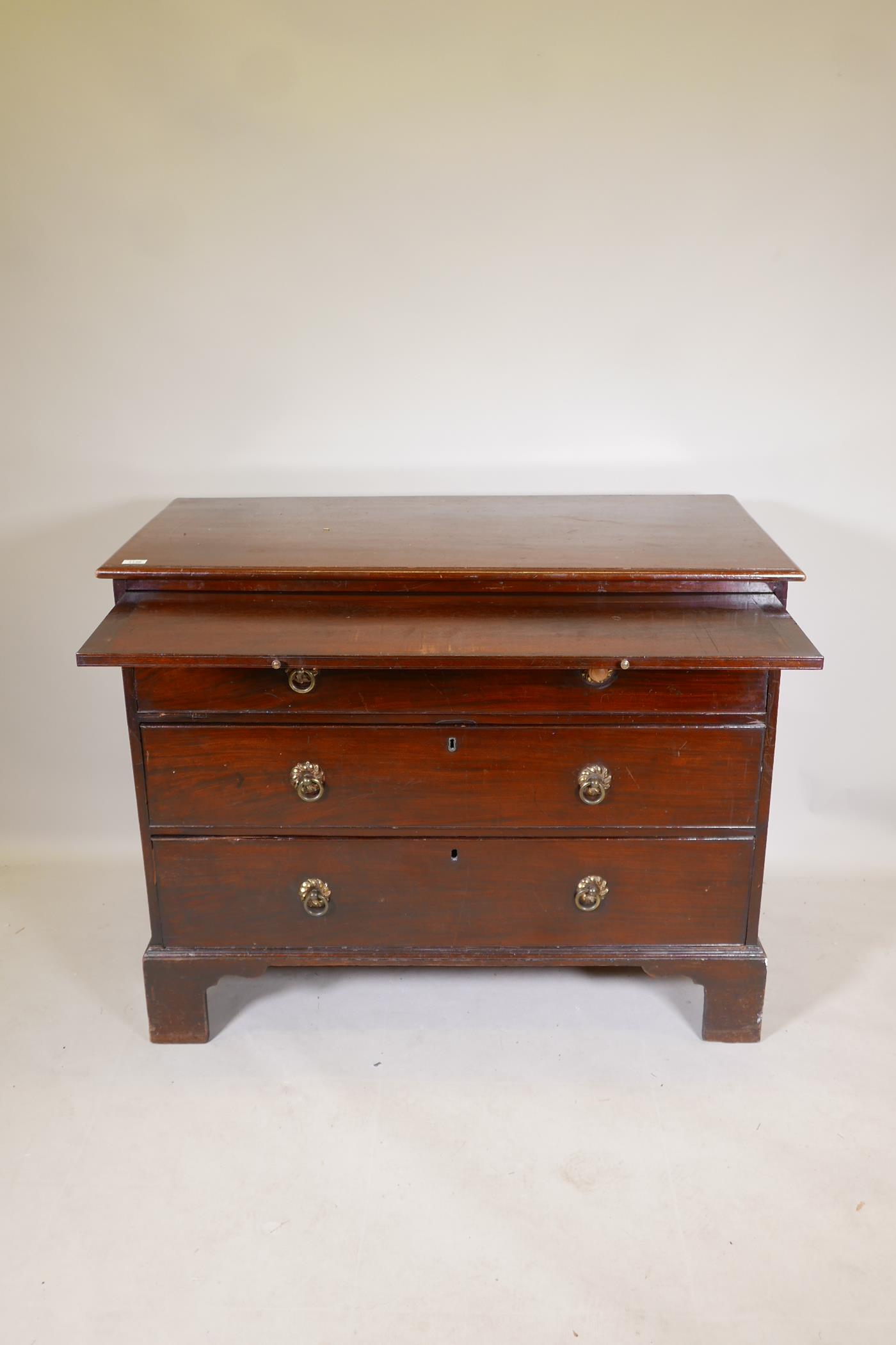 A C19th mahogany chest of three long drawers, under a brushing slide, raised on bracket supports, - Image 3 of 6