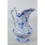 A classical style blue and white pottery ewer decorated with flowers, 12" high