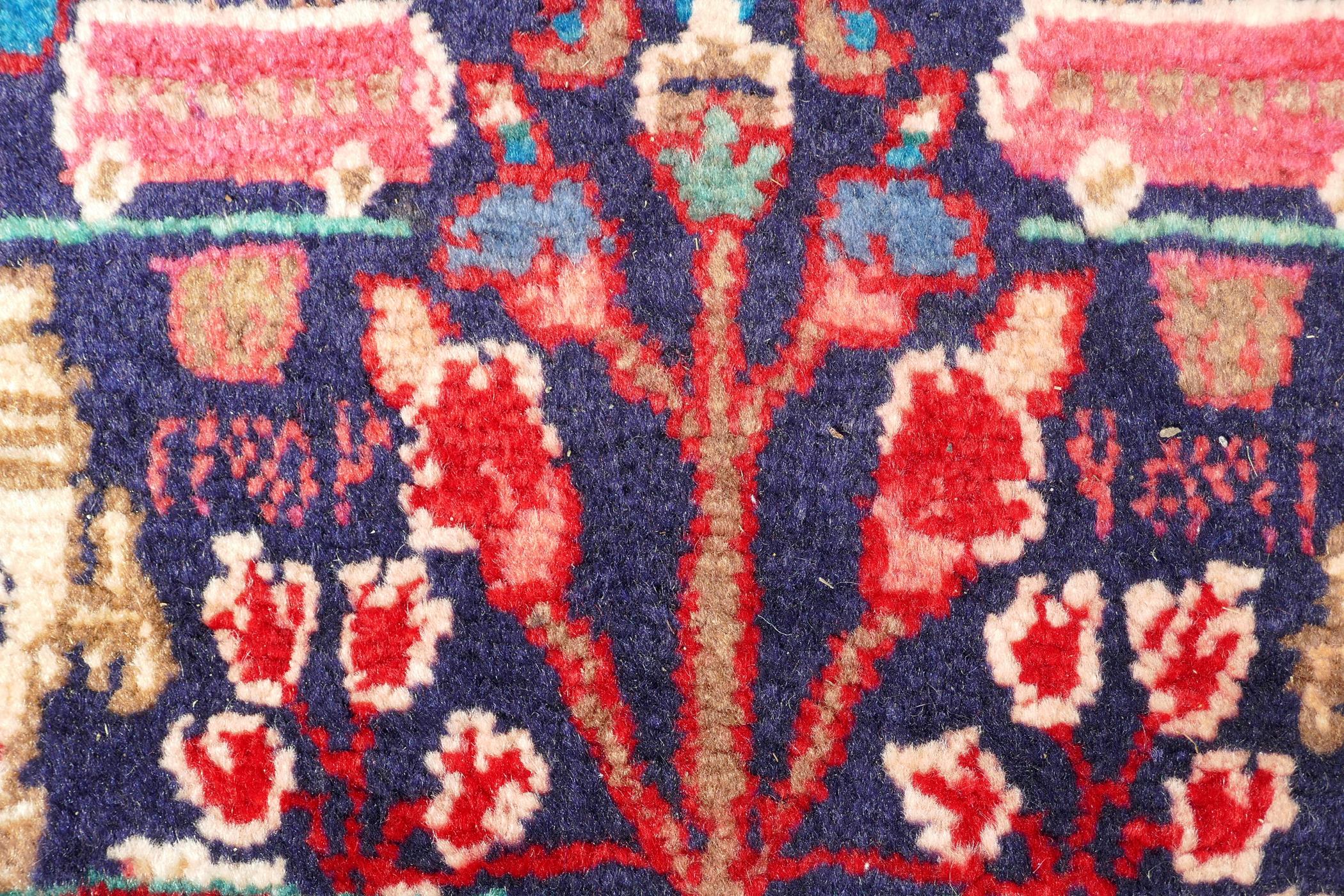 A rich blue ground full pile Persian Sarouk runner with an unique floral pattern, 122" x 41" - Image 4 of 8