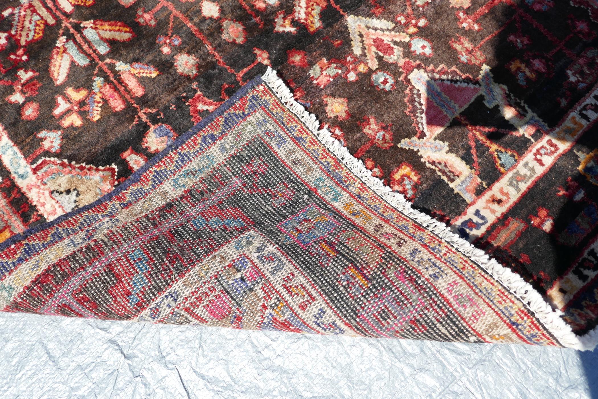 A multicoloured ground Iranian village rug with a bespoke all over design, 116" x 55" - Image 5 of 5