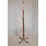A bespoke copper floor lamp, 53" high