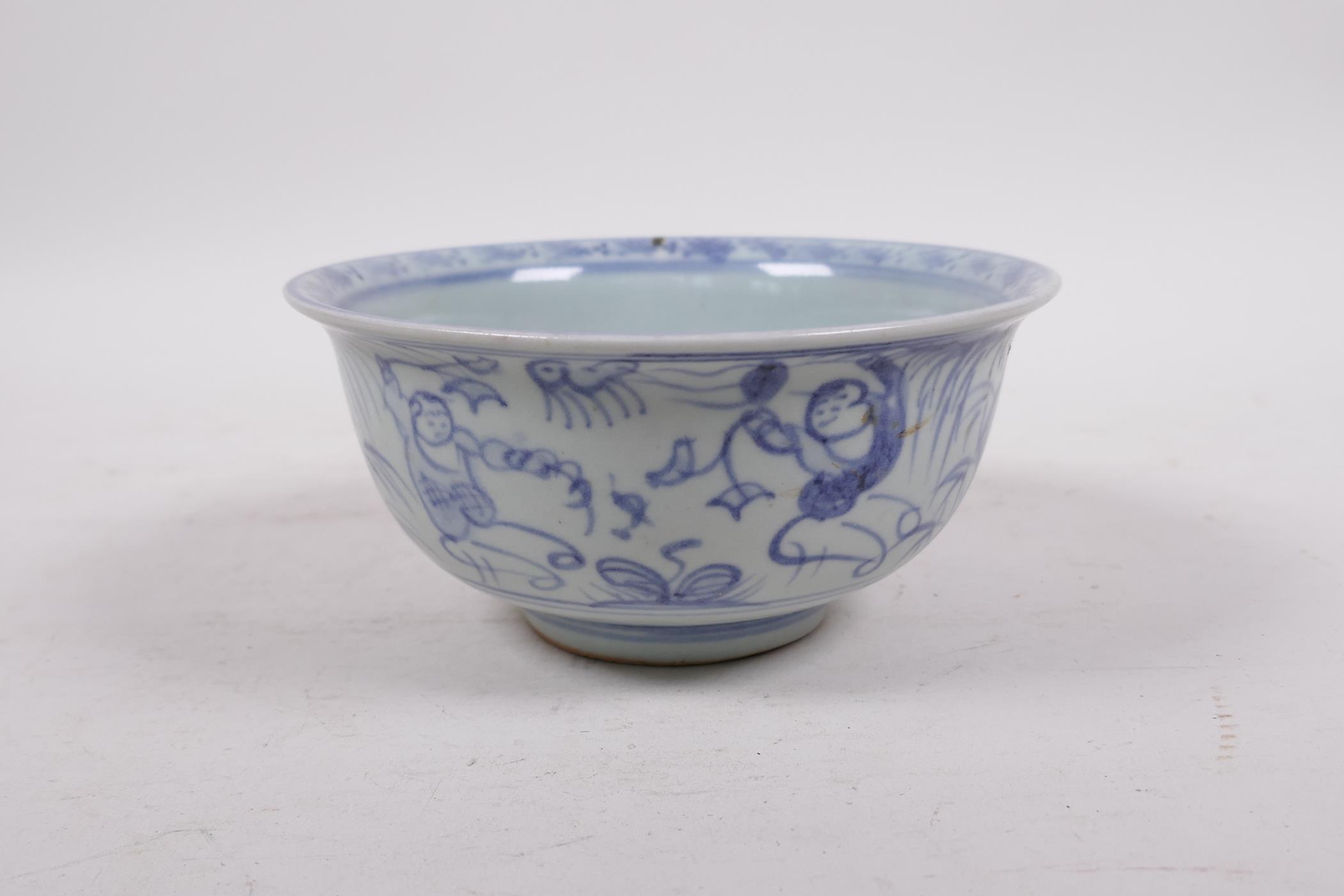 A blue and white porcelain rice bowl, decorated with boys playing in a landscape, 5½" diameter - Image 3 of 5