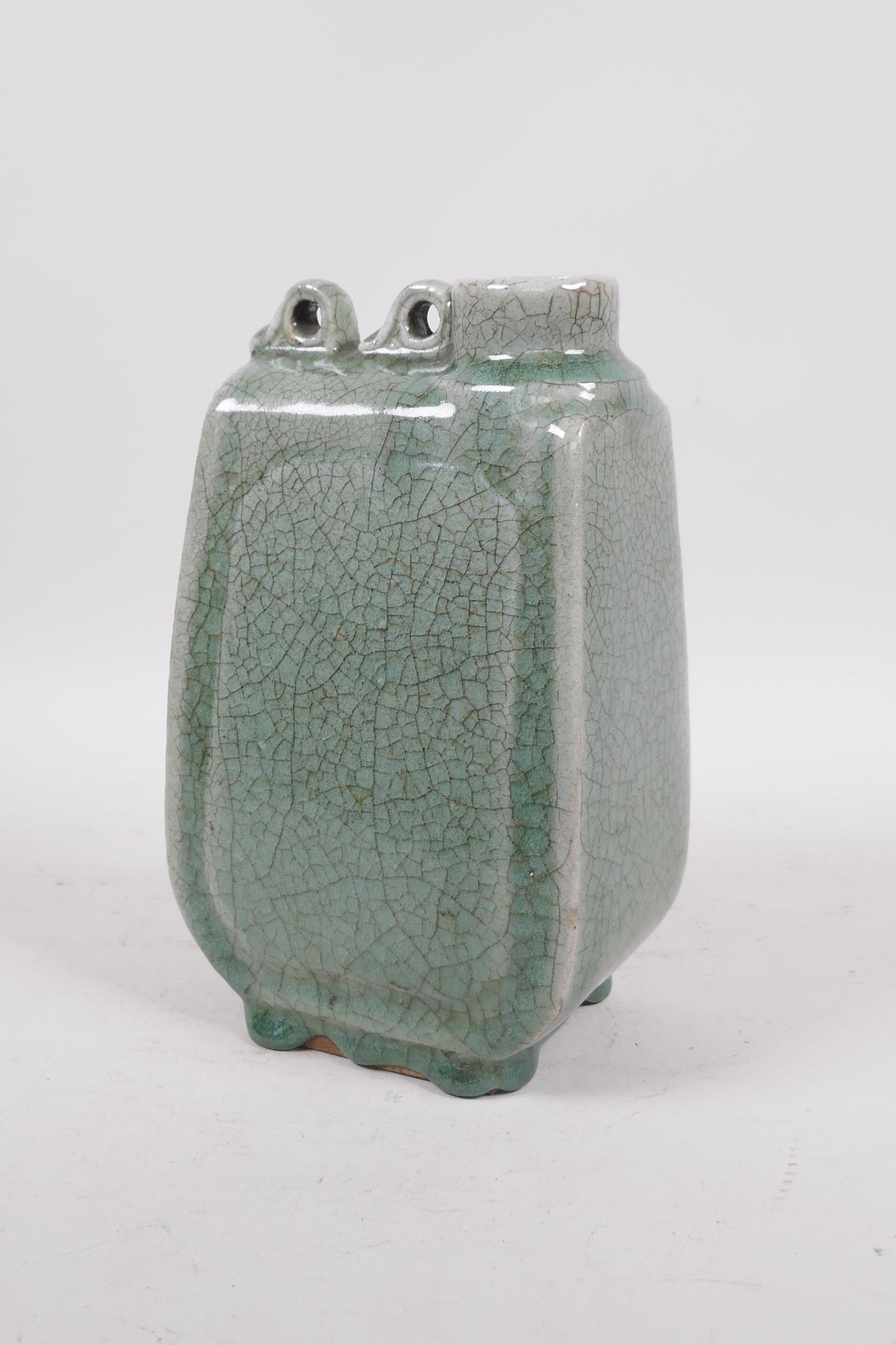 A Chinese green crackle glazed pottery water vessel, 9" high