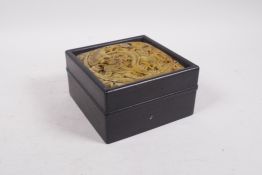 A Chinese carved hardstone and hardwood box, decorated with figures and lotus flowers, 5½" x 5½"