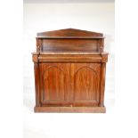 A Victorian rosewood chiffonier, with a single drawer over two doors flanked by columns, 46" x