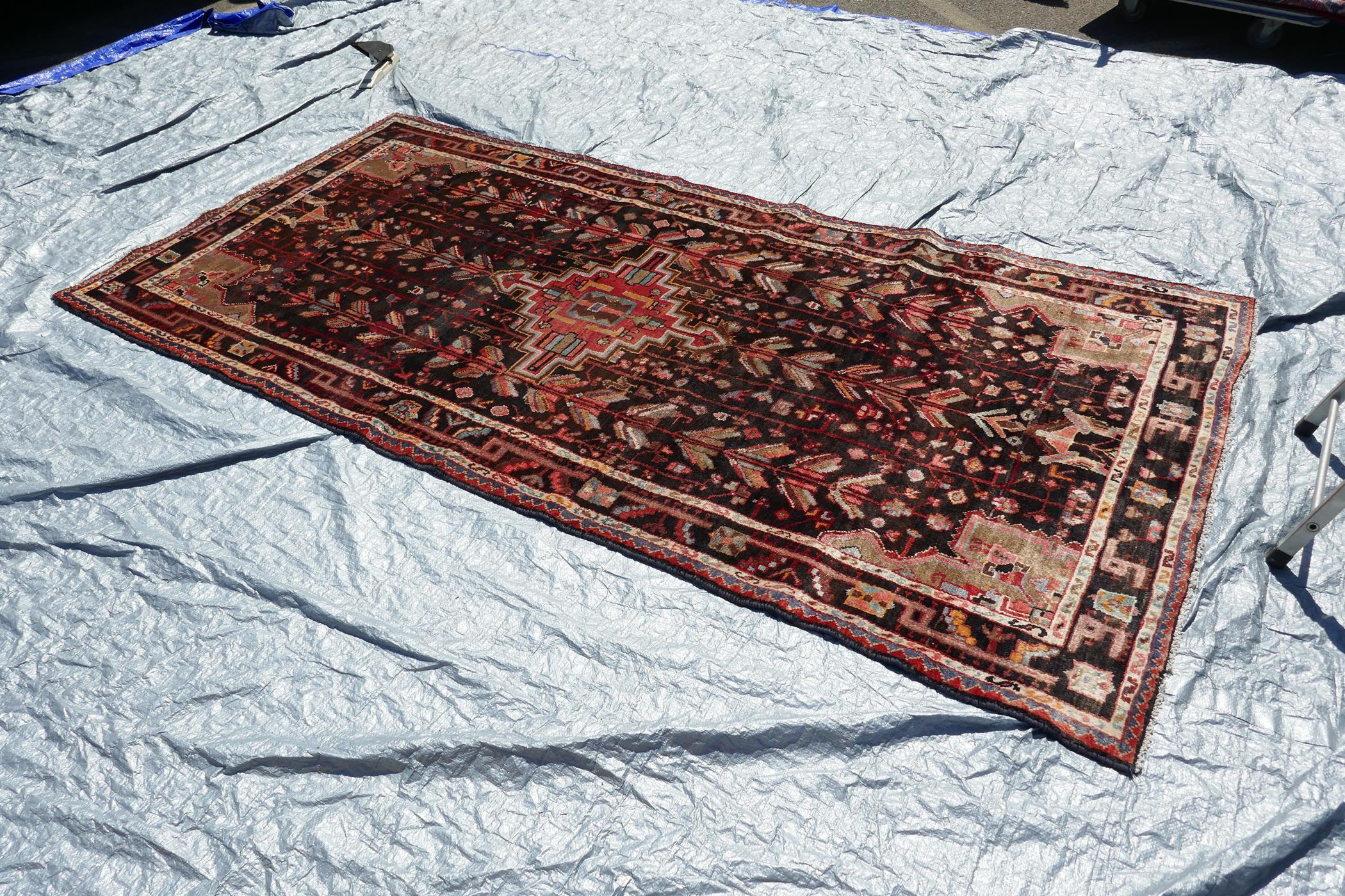 A multicoloured ground Iranian village rug with a bespoke all over design, 116" x 55" - Image 3 of 5