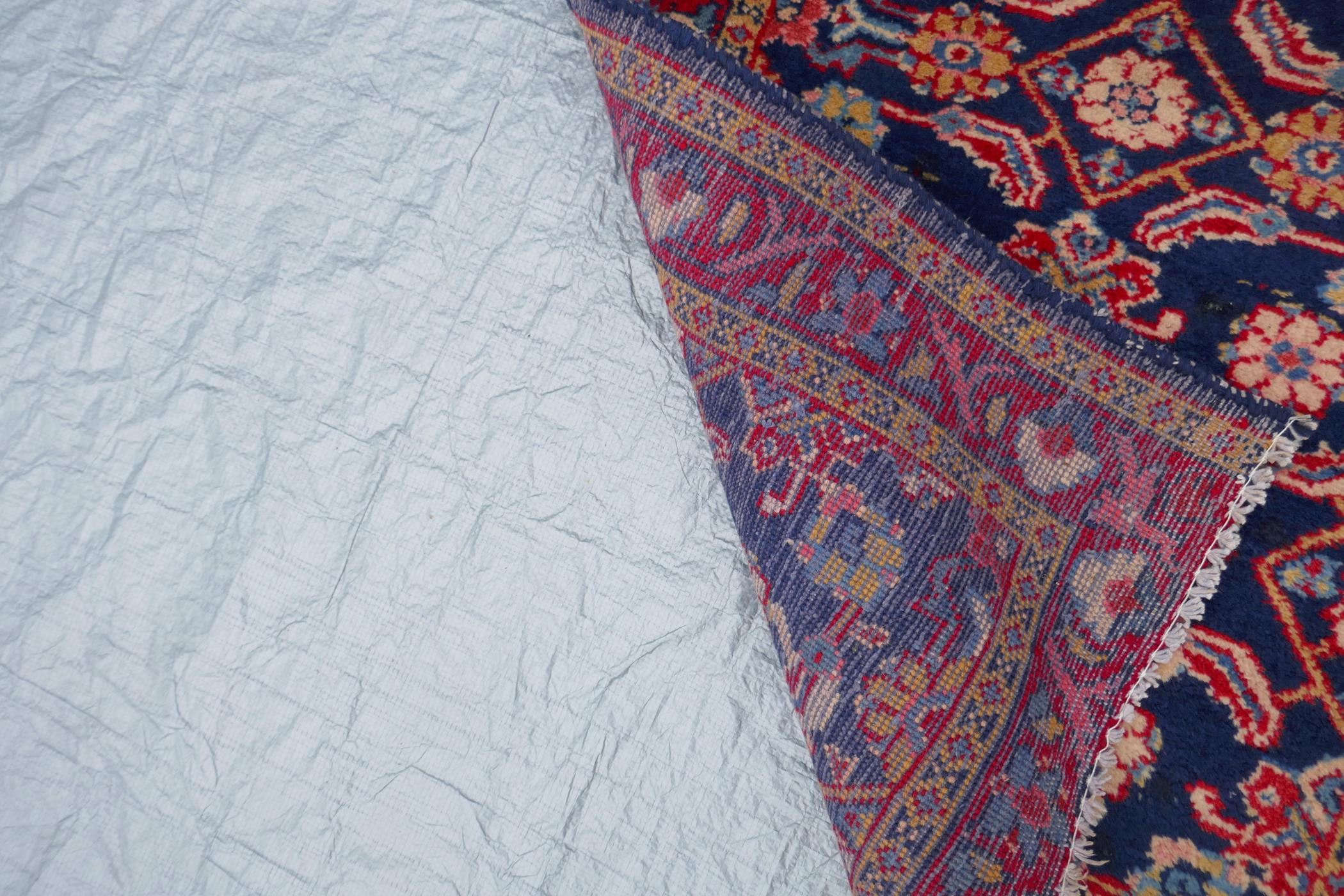 A blue ground Persian Sarouk runner with all over design and red borders, 33" x 140" - Image 7 of 8