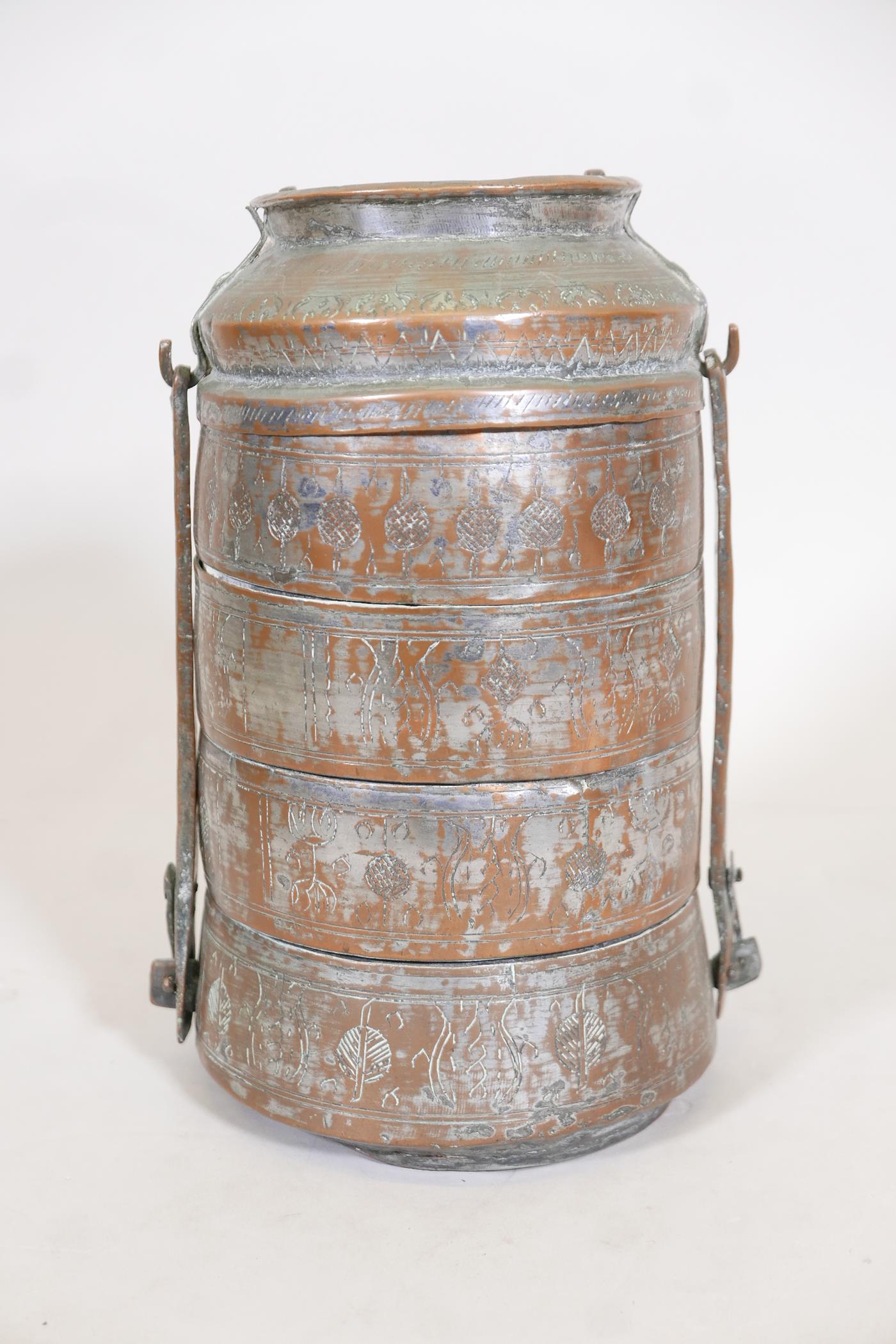 A set of five antique Middle Eastern silvered copper stacking containers, with engraved - Image 2 of 3