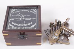 A replica brass travelling sextant in a hardwood case, 4½" square