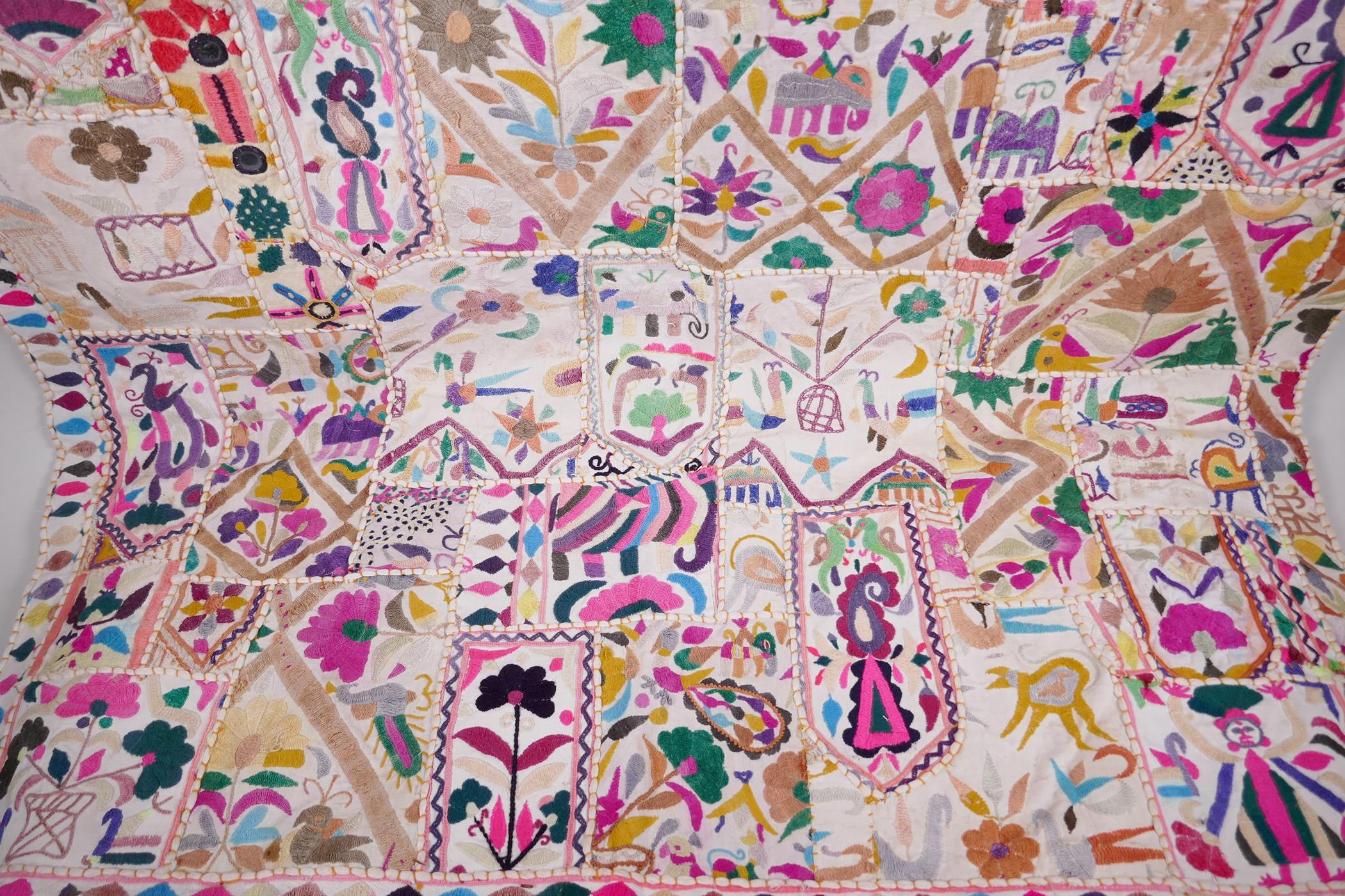 An Indian embroidered wall hanging decorated with flowers, figures, birds etc, 39" x 58" - Image 3 of 5