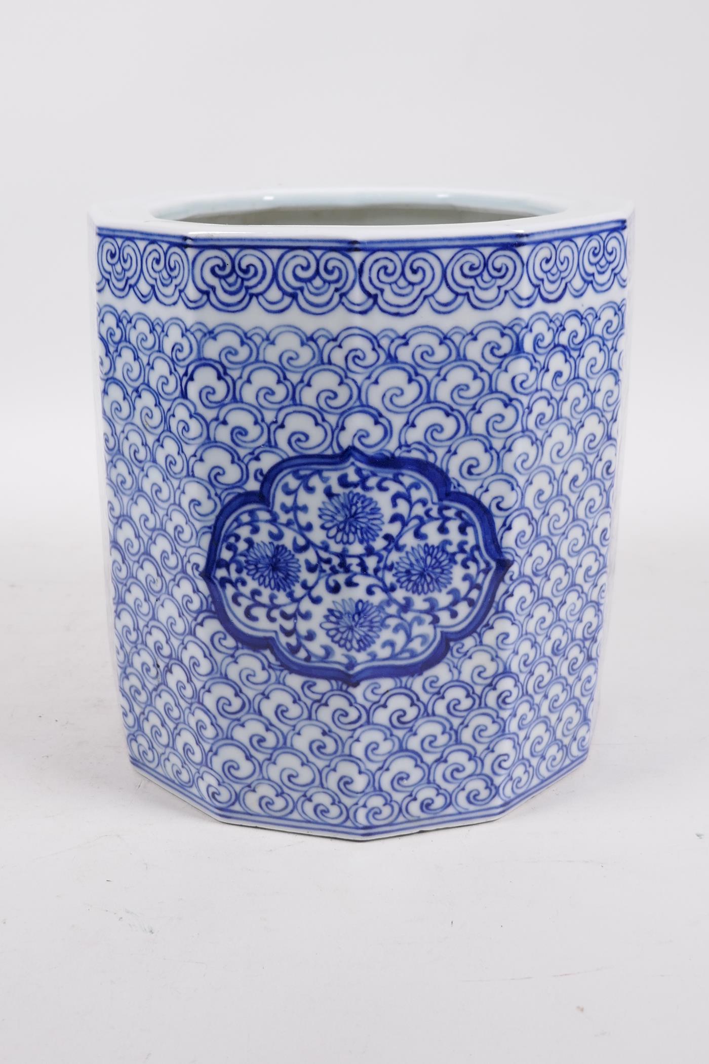 A Chinese Republic blue and white porcelain brush pot with decorative floral panels, 7" high x 7" - Image 2 of 5