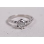 A platinum and diamond solitaire ring, 0.66ct, 3.5g, size L