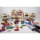 A collection of toys including early Dinky, Corgi boxed Yesteryear commercial vehicles etc