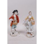A pair of Dresden porcelain figures, a male rabbit seller and a goose girl, 7½" high