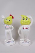 A pair of replica cast iron advertising money boxes for Esso Petroleum, 'Andy and Abby Slick', 9½"
