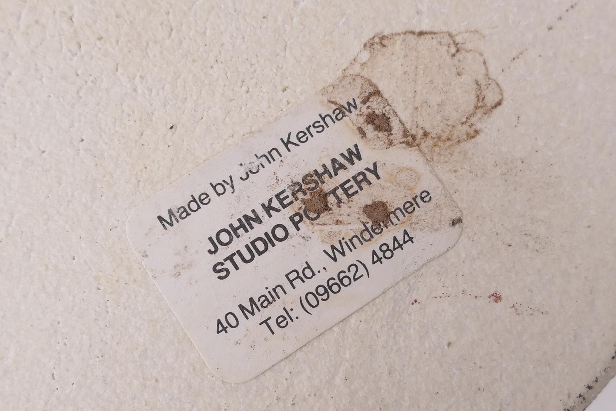 A studio pottery portrait wall plaque by John Kershaw, label verso, 11" x 11½" - Image 3 of 3